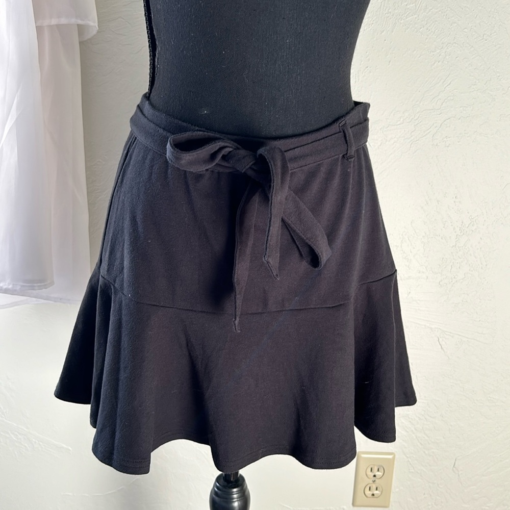 Black ruffle mini skater skirt w/ belt